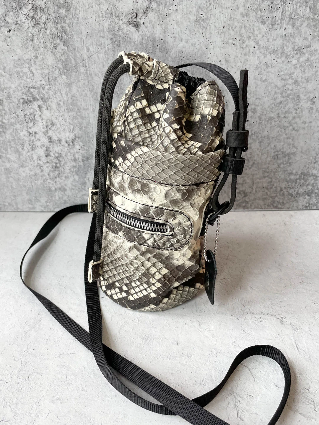 Riel Drawstring Mini Bucket Crossbody Bag, Beige Snake Riel